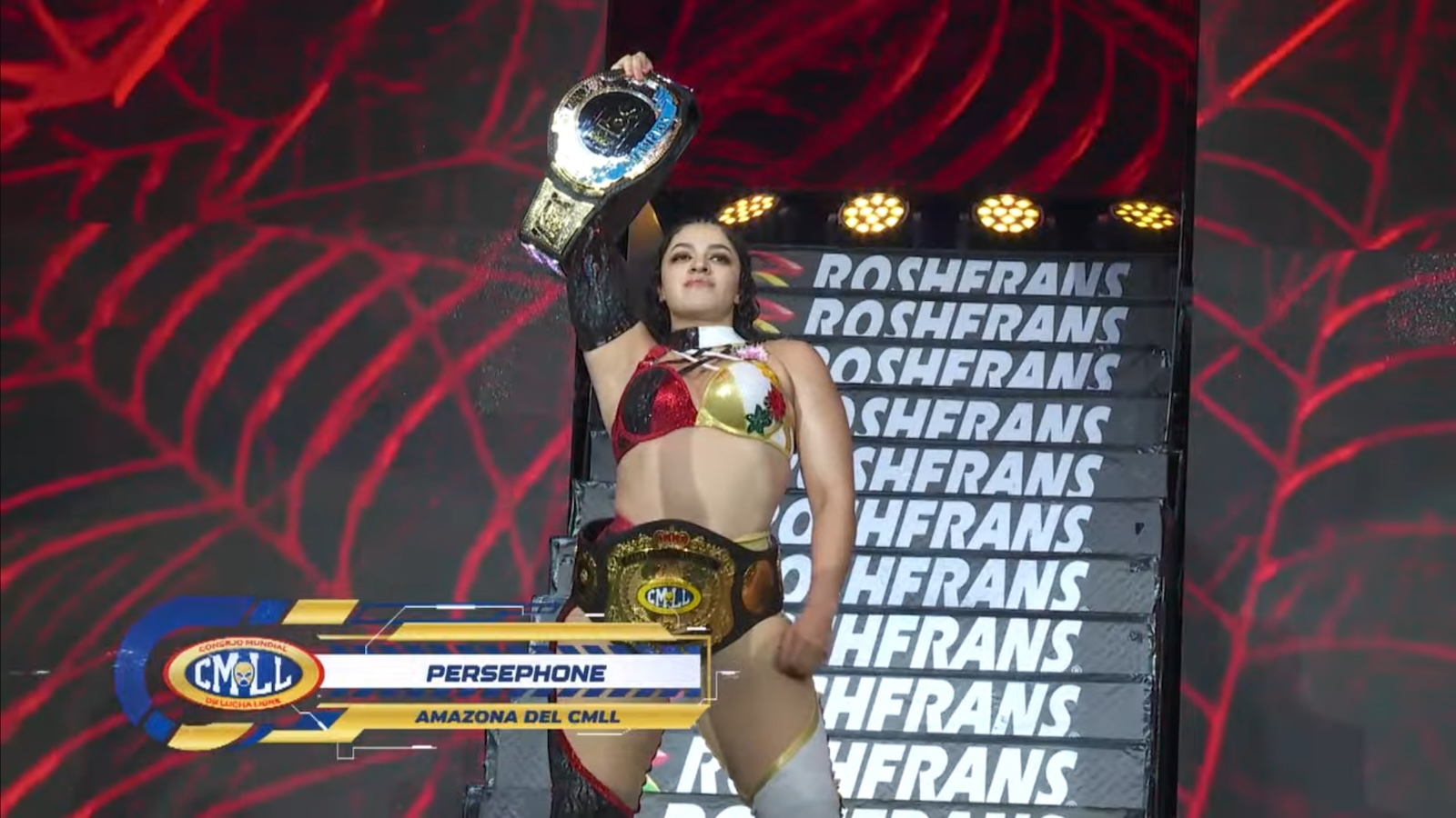 Persephone with two title belts