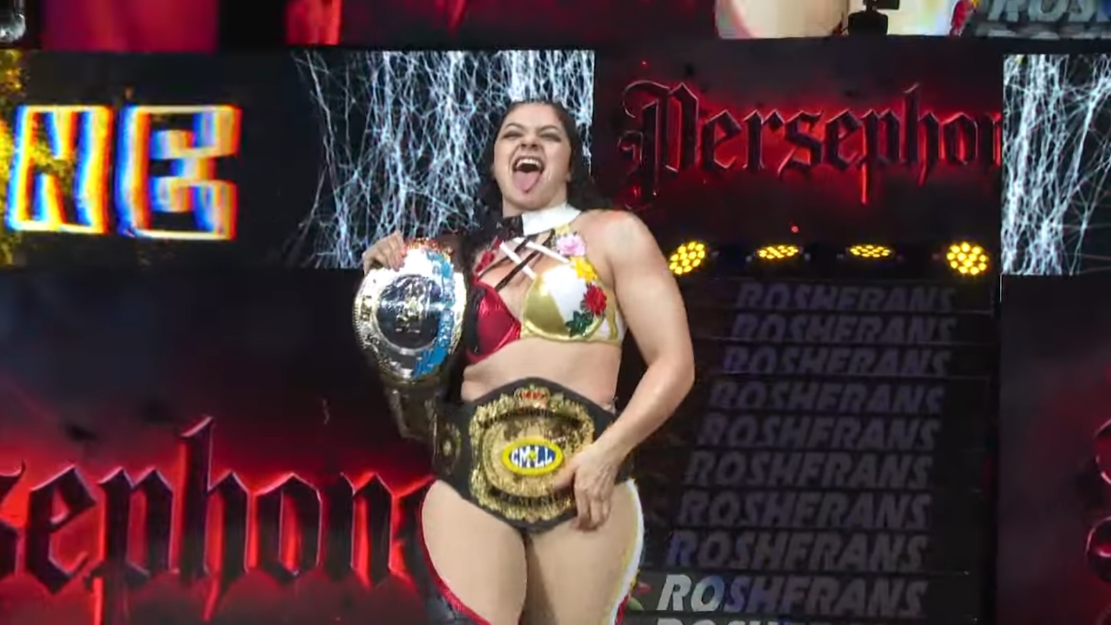 Persephone with two title belts